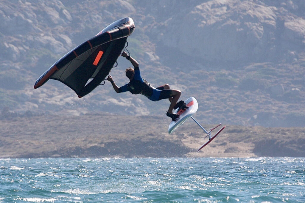 Wingfoils surfers in the air in Naxos