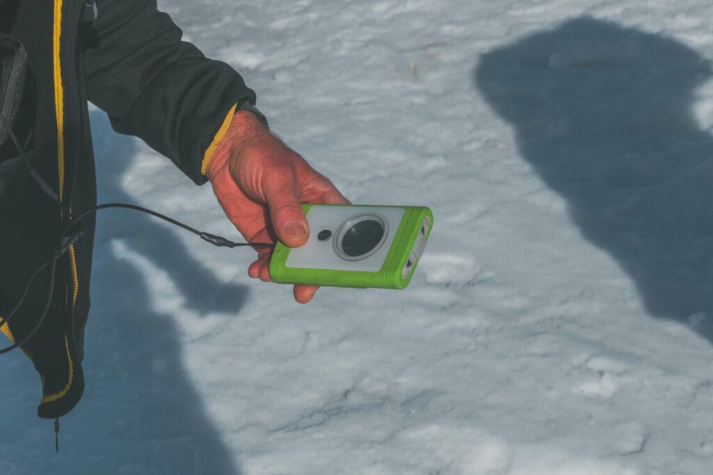 Avalanche transceiver at the camp on the Dachstein