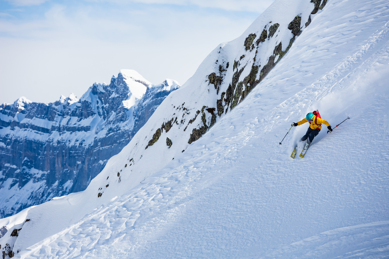 Skier skiing down the mountain Mont Blanc Switzerland